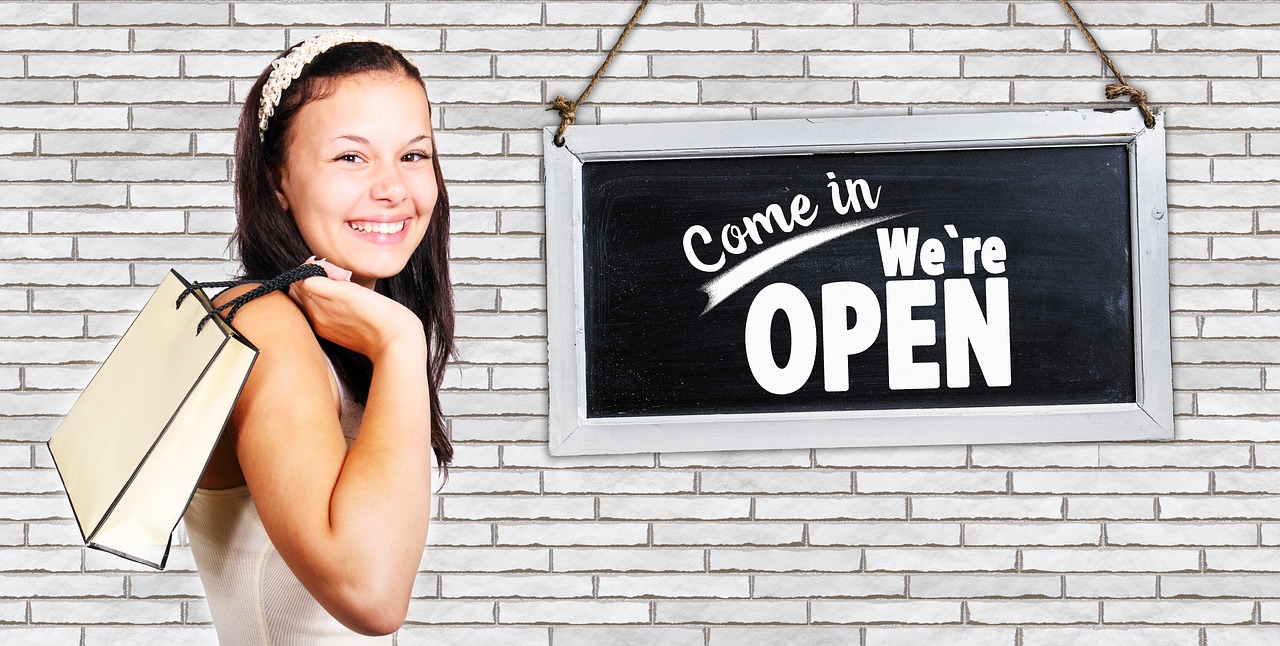 Open sign in a storefront door